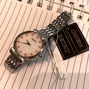 Dusty rose stainless steel watch with touches of Swarovski crystals